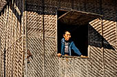 Inle Lake Myanmar. All the buildings are constructed on piles. Residents travel around by canoe, but there are also bamboo walkways and bridges over the canals, monasteries and stupas. 